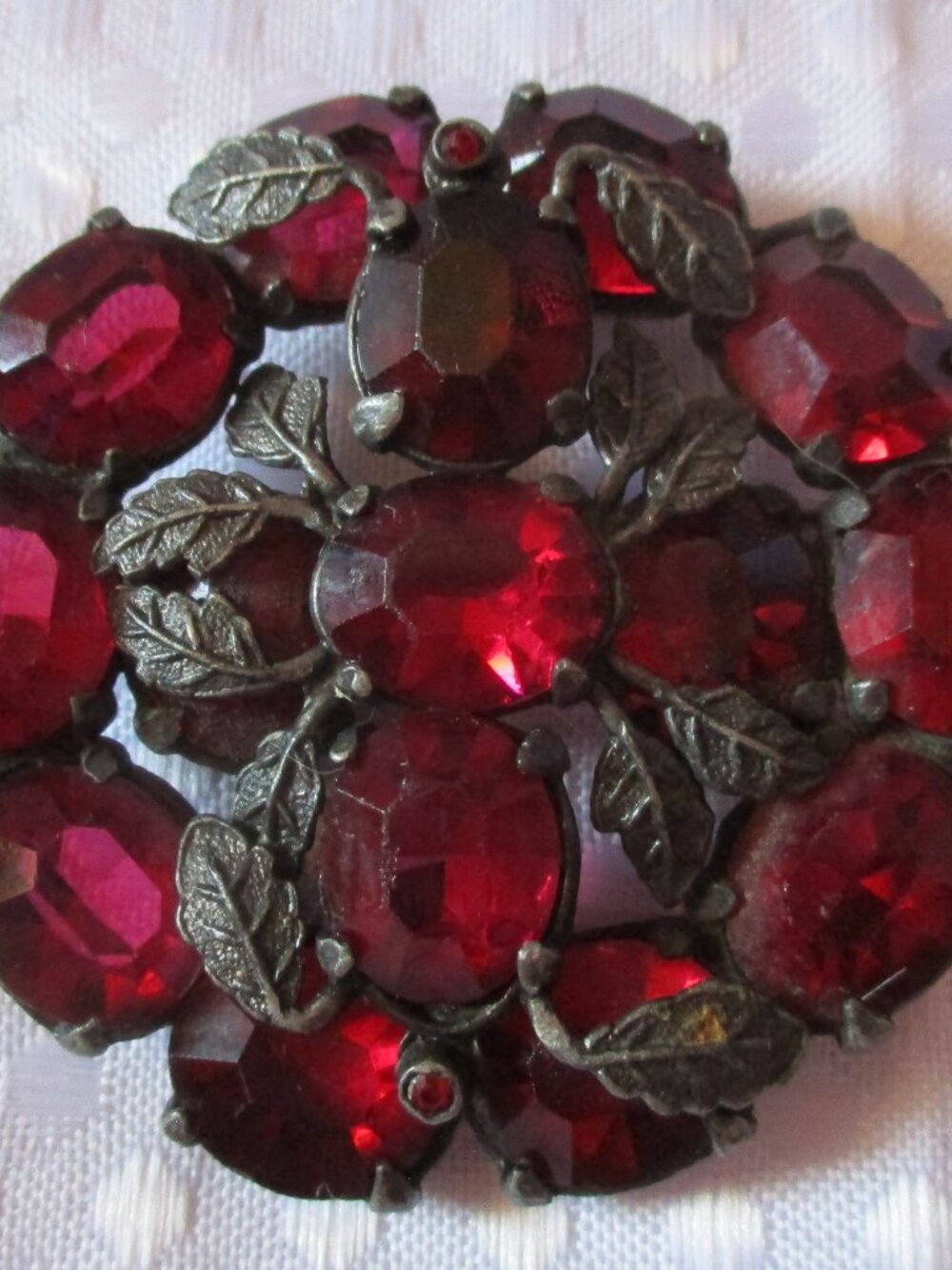 1950's Red Glass Rhinestone Pin/Brooch with Textured Metal Leaves  Sz. 2"
